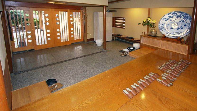 Traditional Japanese genkan with slippers